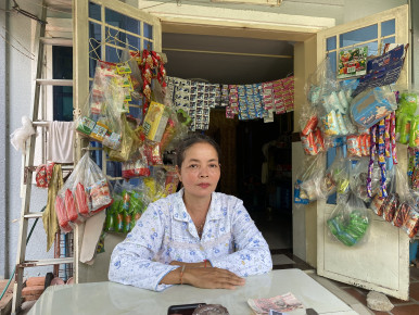 Mrs. Oeun Sam Oun at her store